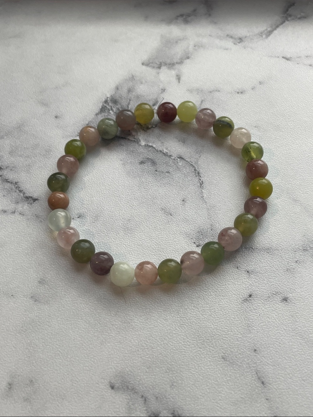 Natural stone, hand beaded elastic bracelet. 7 inches.